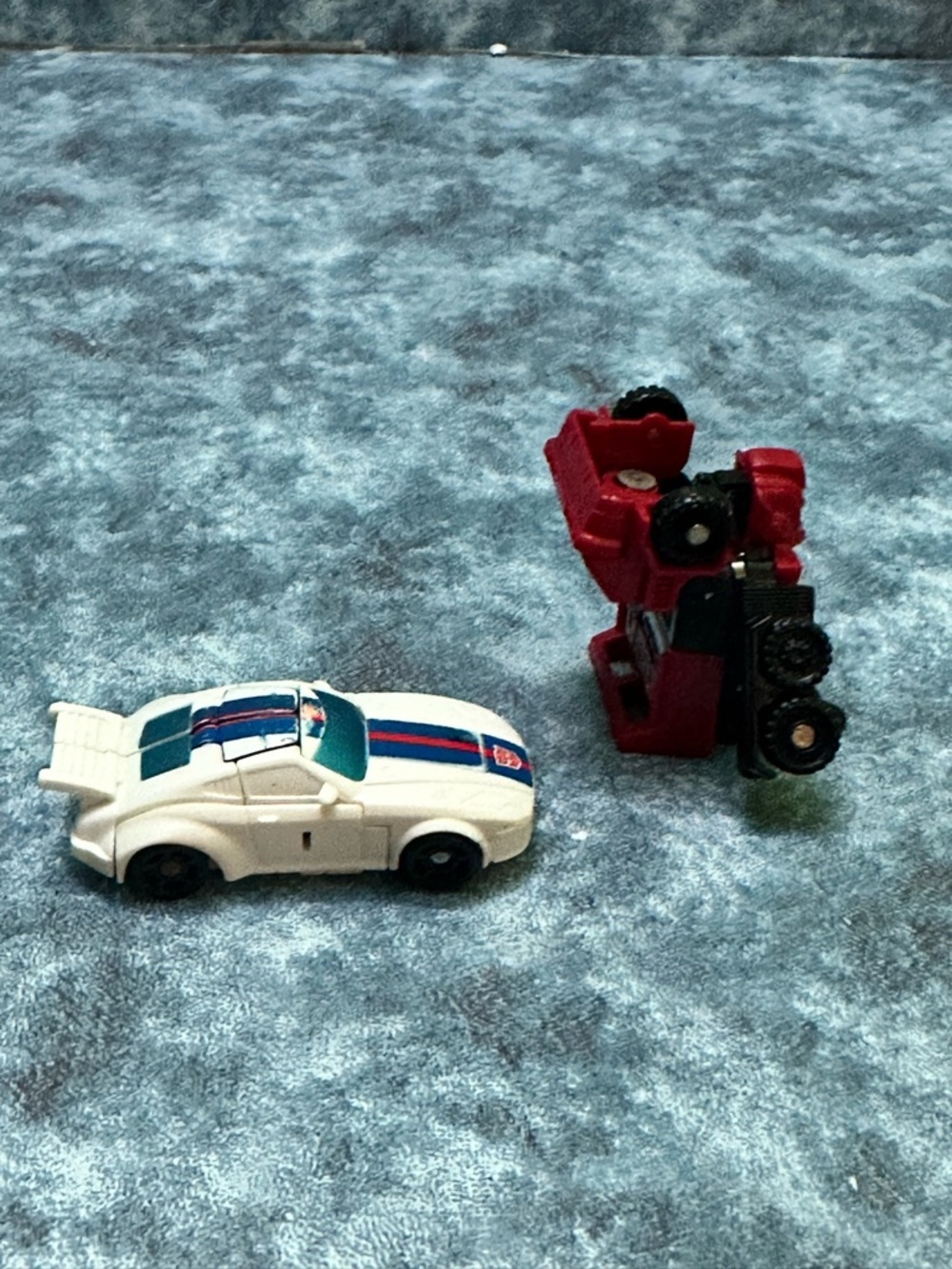 Hasbro Red and White Transformer Robot with Blue-Striped Race Car - Picture 2 of 6